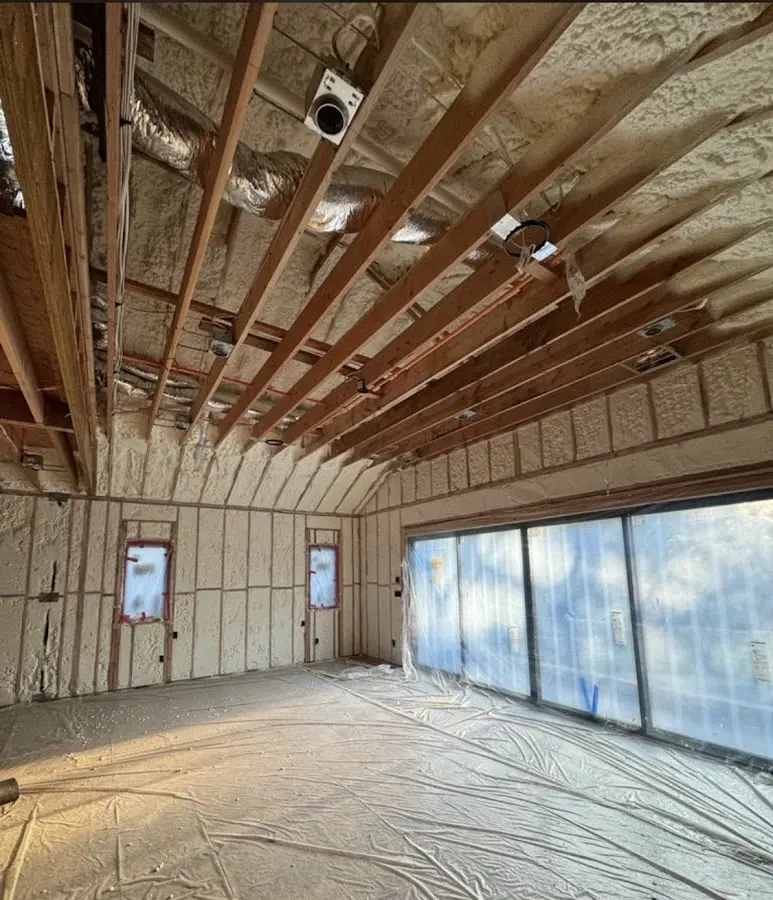 Interior walls and ceiling insulated with spray foam during new construction in Hartford